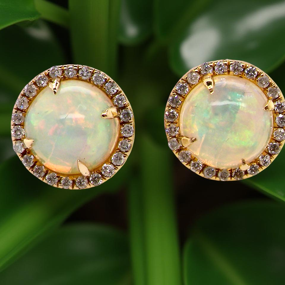 An exquisite pair of opal and diamond earrings