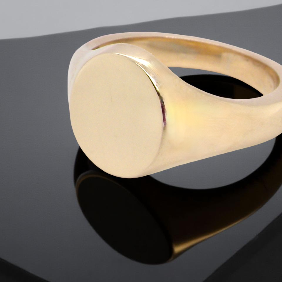 An extra heavy gentleman's Oxford gold signet ring. 