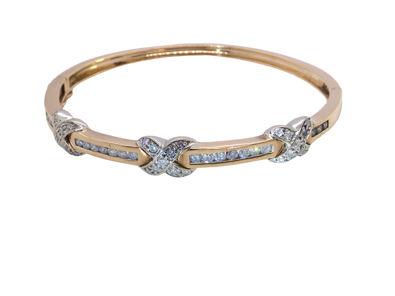 An impressive 9 carat gold bangle.
Three 'kiss' shaped sections ,