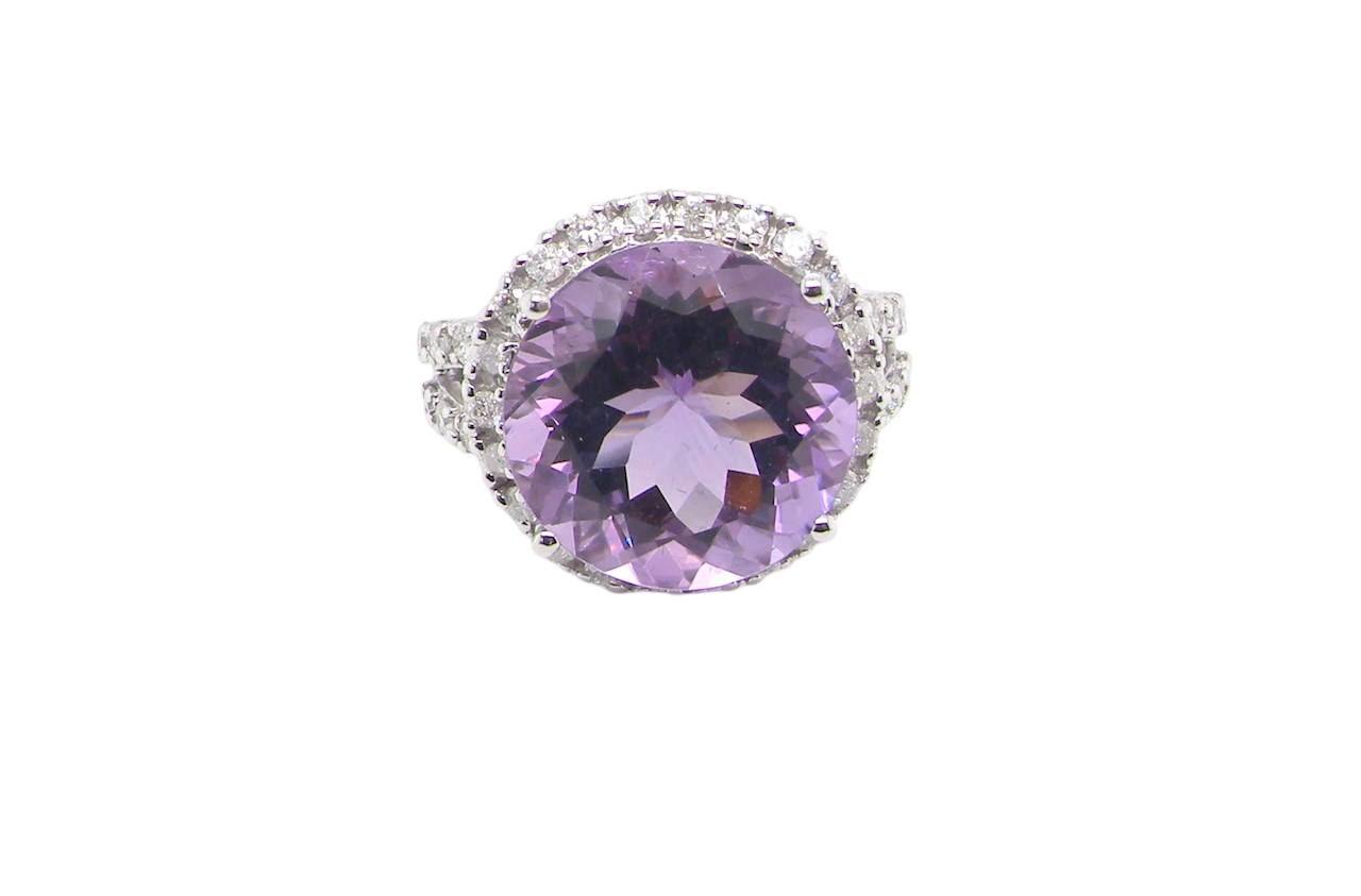 An impressive Amethyst and Diamond cluster ring
