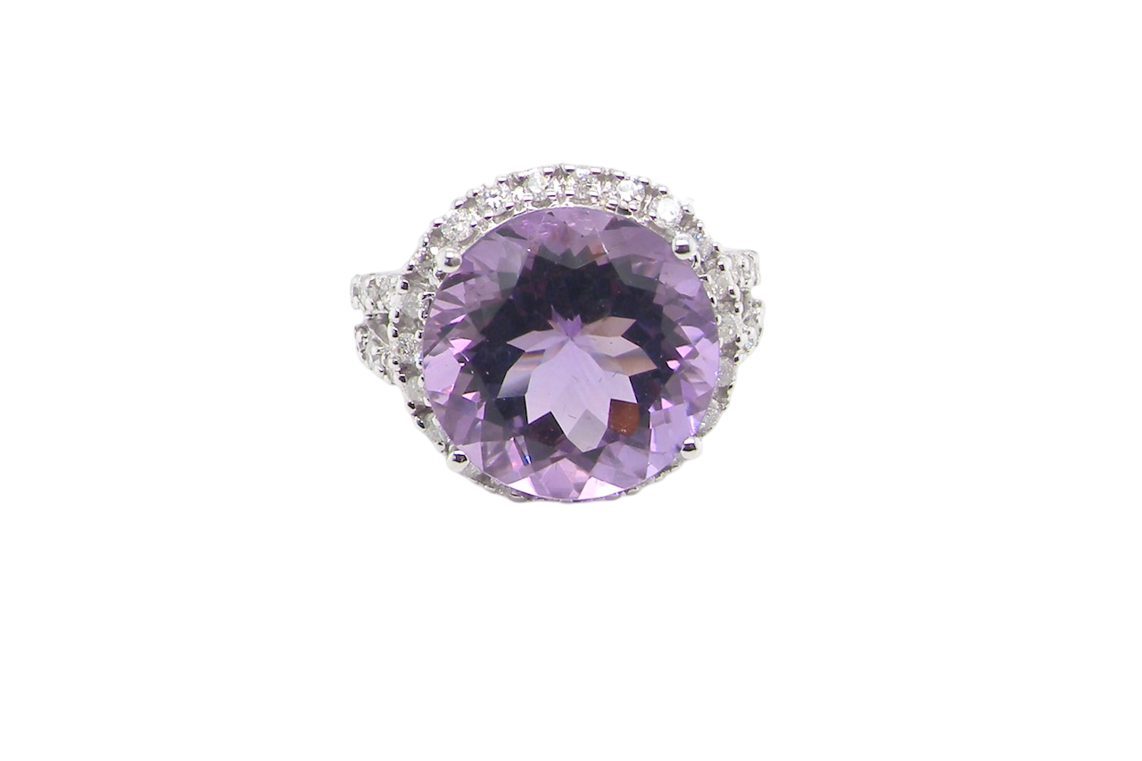 An impressive Amethyst and Diamond cluster ring