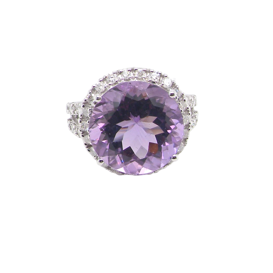 An impressive Amethyst and Diamond cluster ring