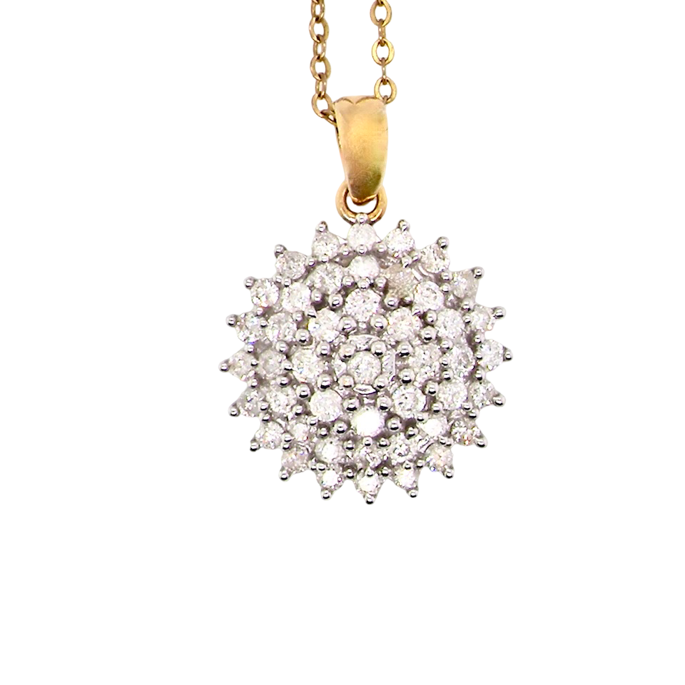 An impressive diamond pendant, set with multiple round brilliant-cut diamonds,
