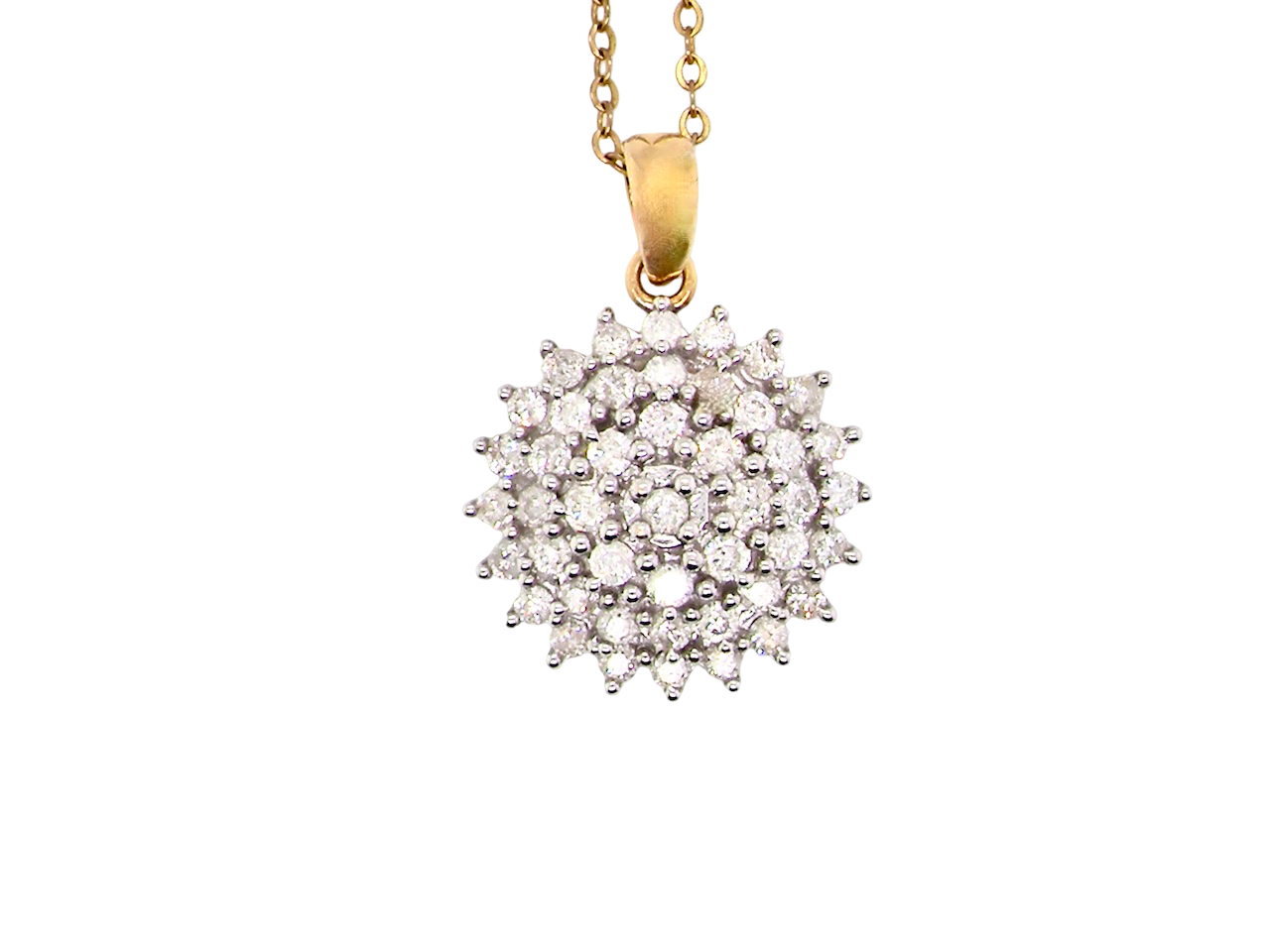 An impressive diamond pendant, set with multiple round brilliant-cut diamonds,