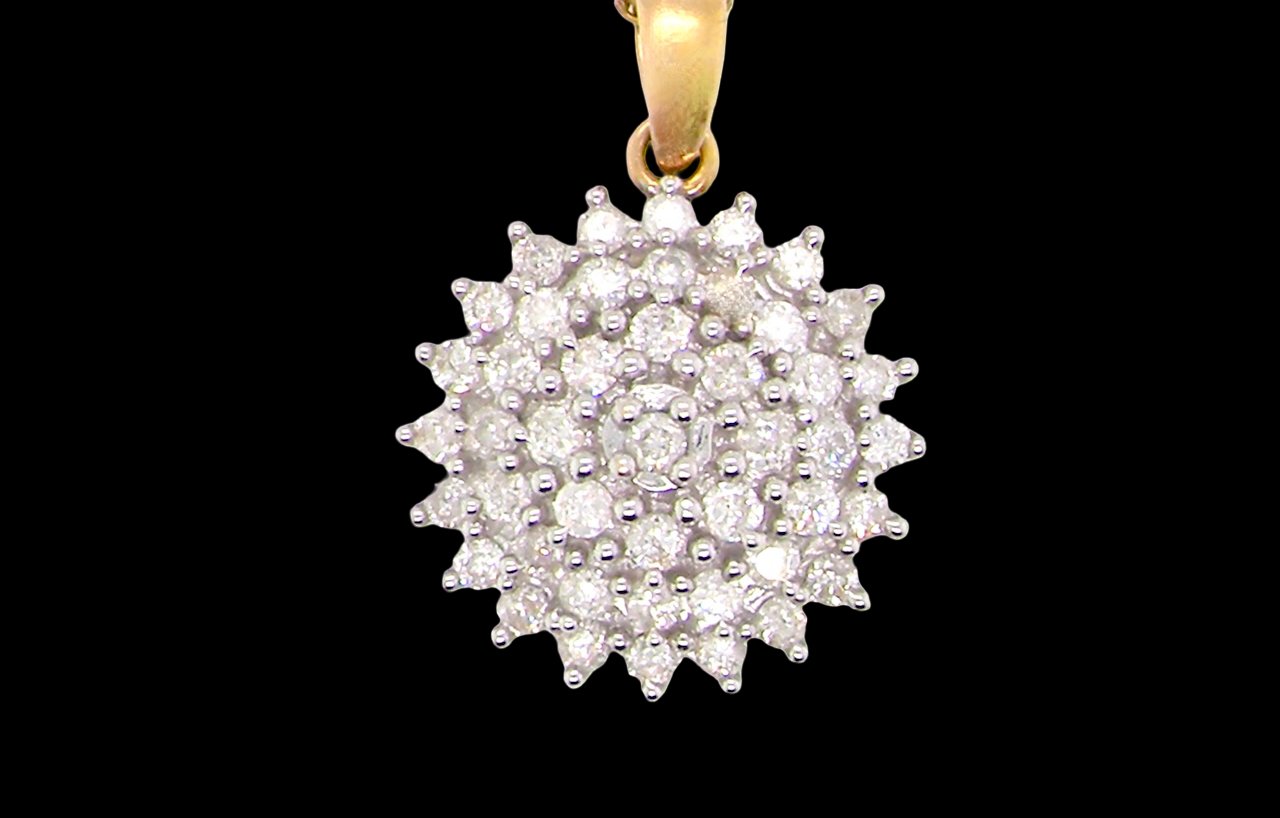 An impressive diamond pendant, set with round brilliant-cut diamonds,