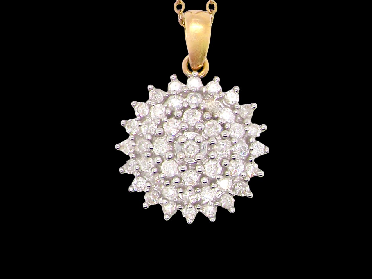 An impressive diamond pendant, set with round brilliant-cut diamonds,