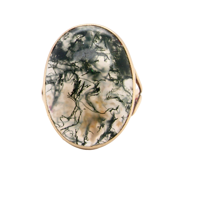 An impressive dress ring set with a large moss agate gem stone.