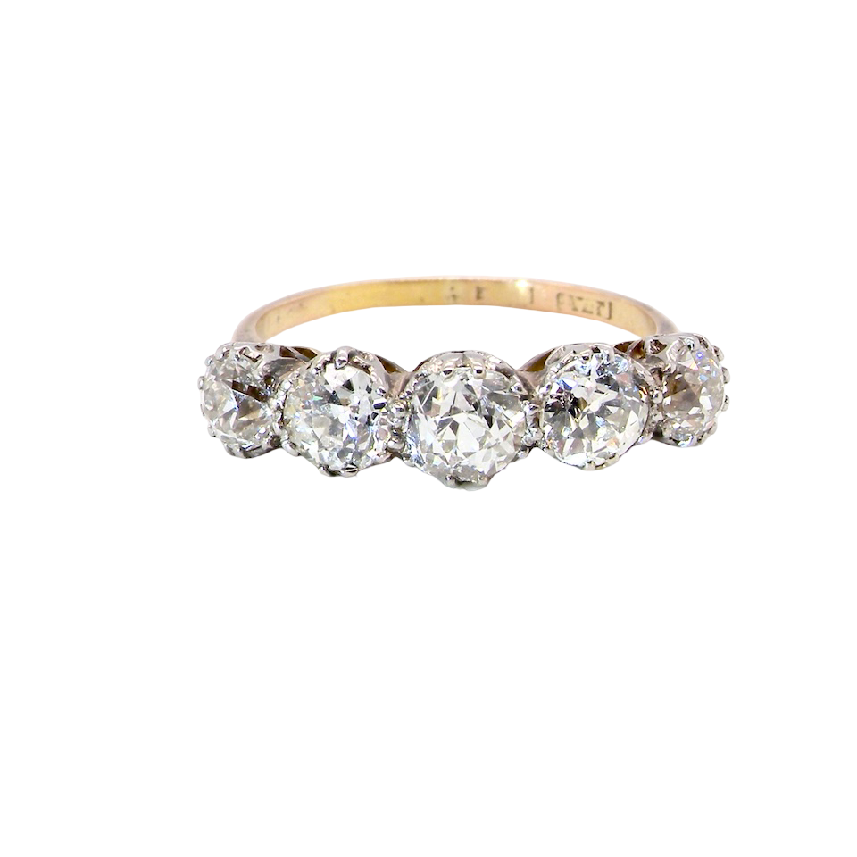 An impressive early 20th-century ring set with five old brilliant-cut white diamonds.