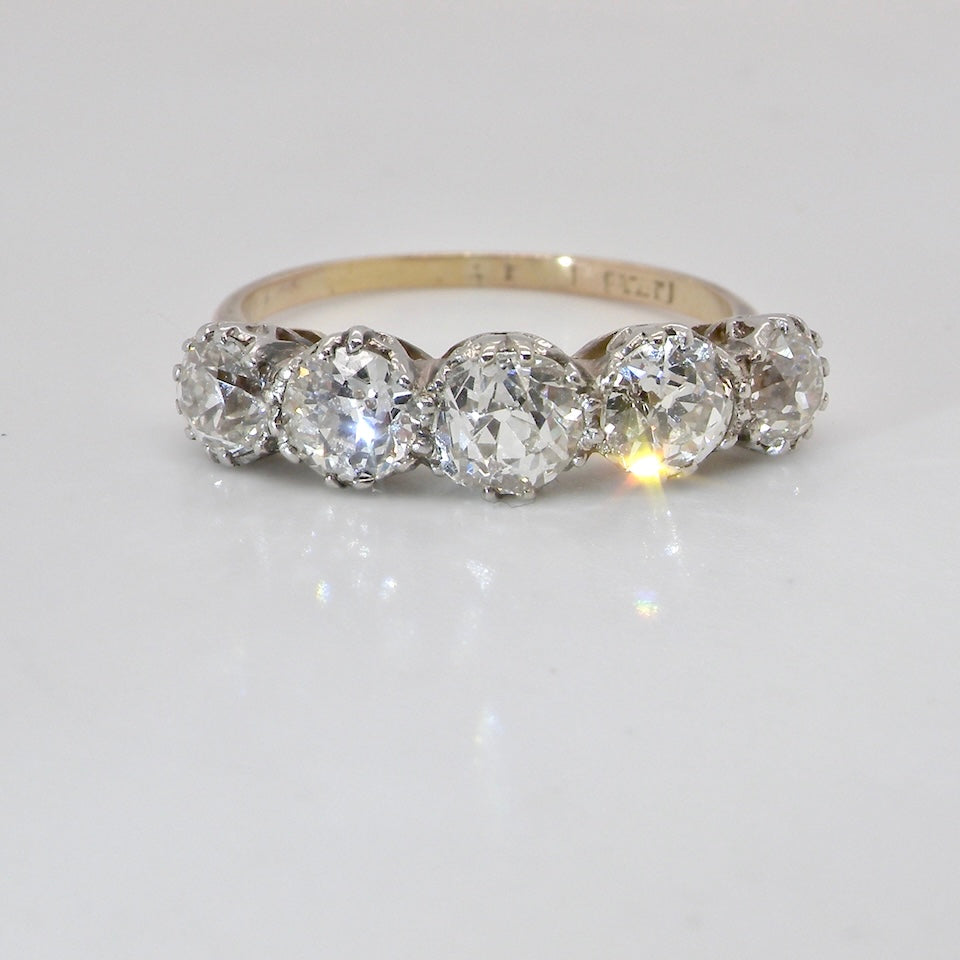 An impressive early 20th-century ring set with five white diamonds.