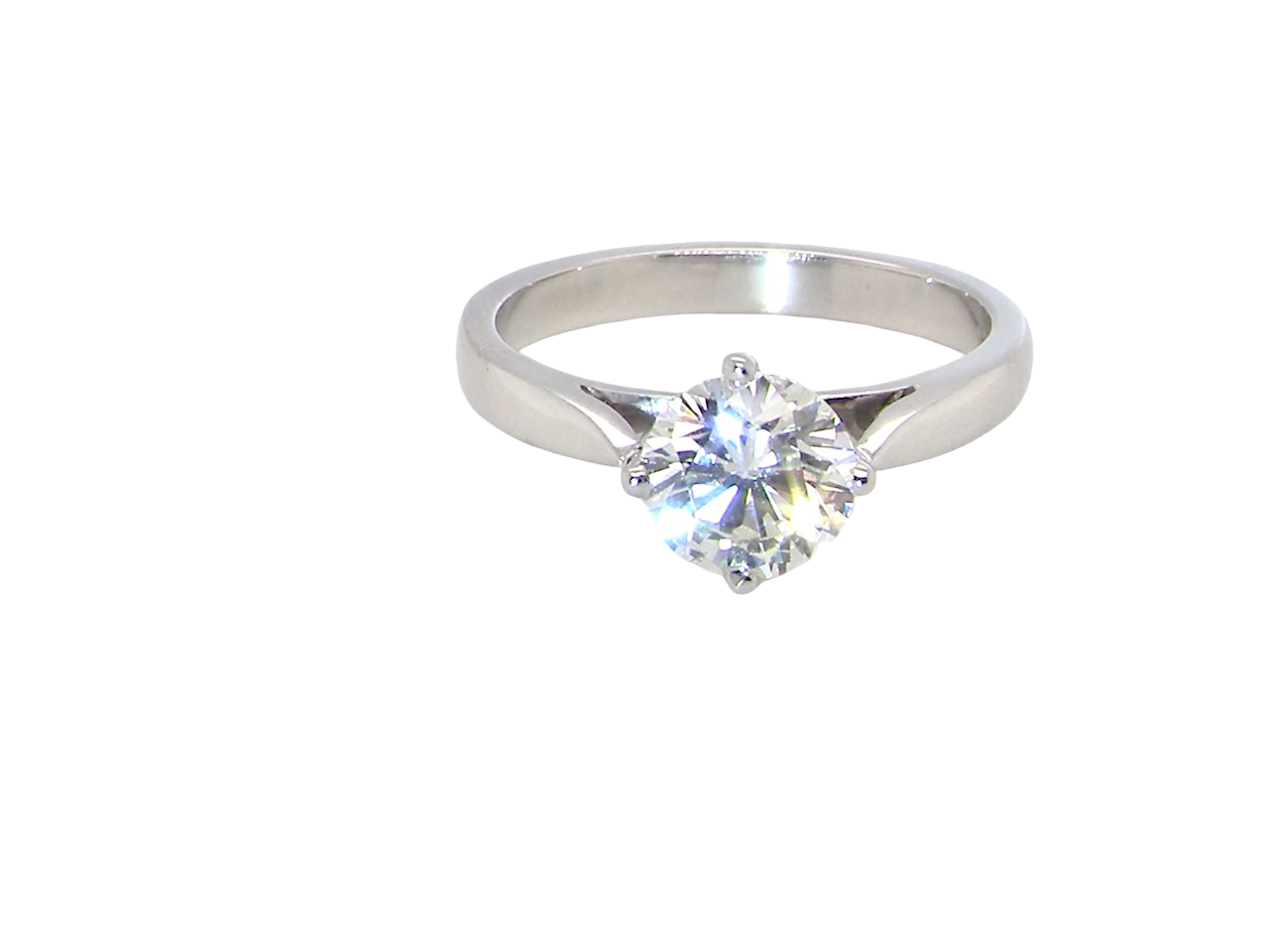An impressive platinum solitaire ring set with a modern brilliant-cut white diamond.
