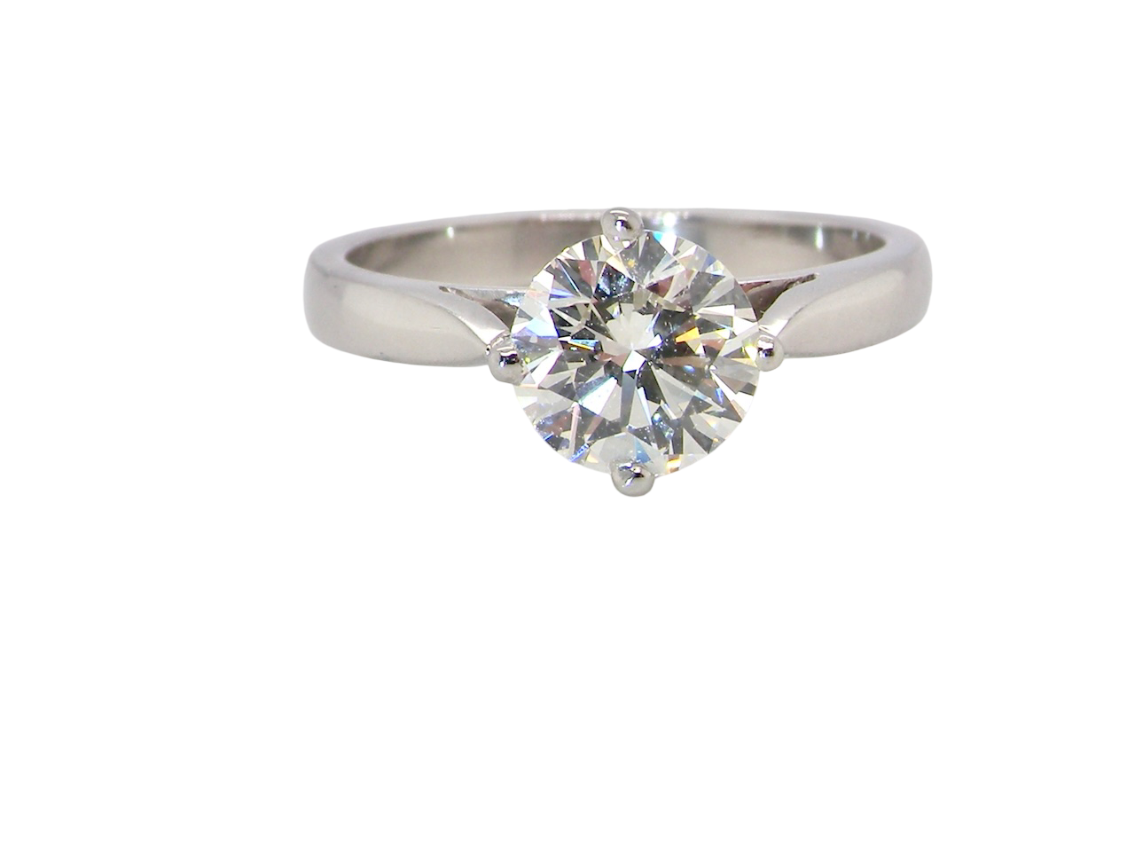 An impressive platinum solitaire ring set with a modern brilliant-cut white diamond. A