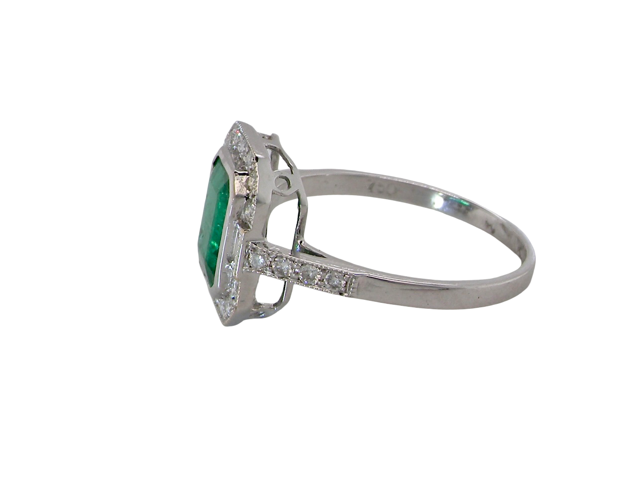 An  Emerald and Diamond Cluster Ring – 18 carat White Gold