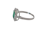 An  Emerald and Diamond Cluster Ring – 18 carat White Gold