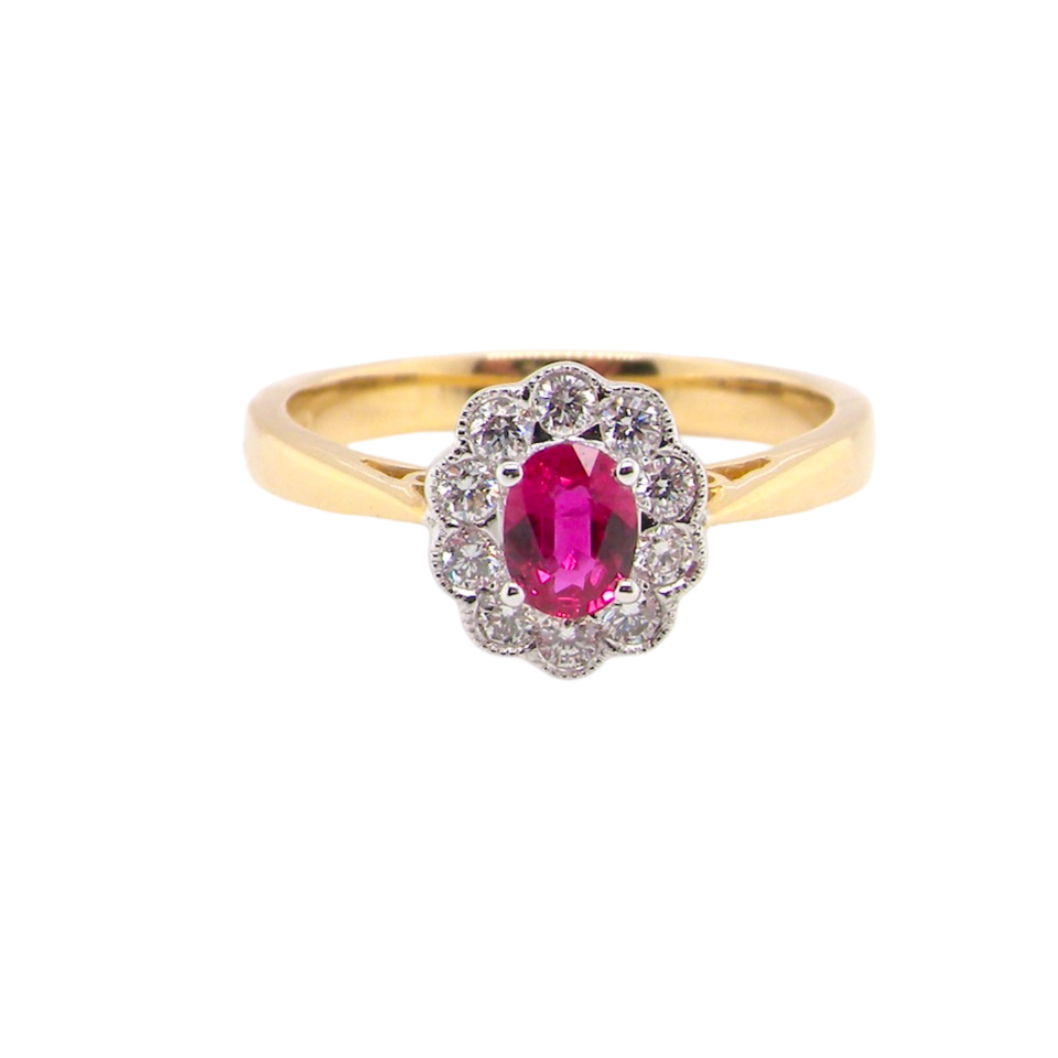 An oval cluster Ruby and Diamond Ring