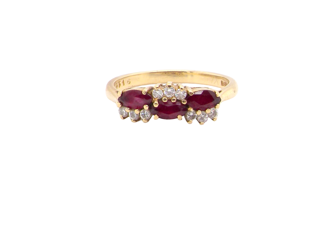 An unusual ring featuring three marquise-cut rubies (5×3 mm each).