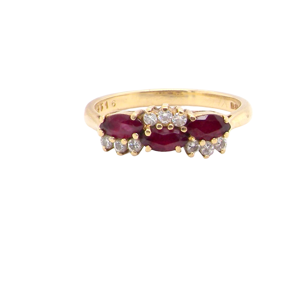 An unusual ring featuring three marquise-cut rubies (5×3 mm each).