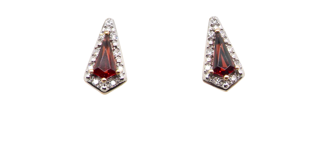 An unusual shaped pair of earrings. To the centre a kite shaped garnet