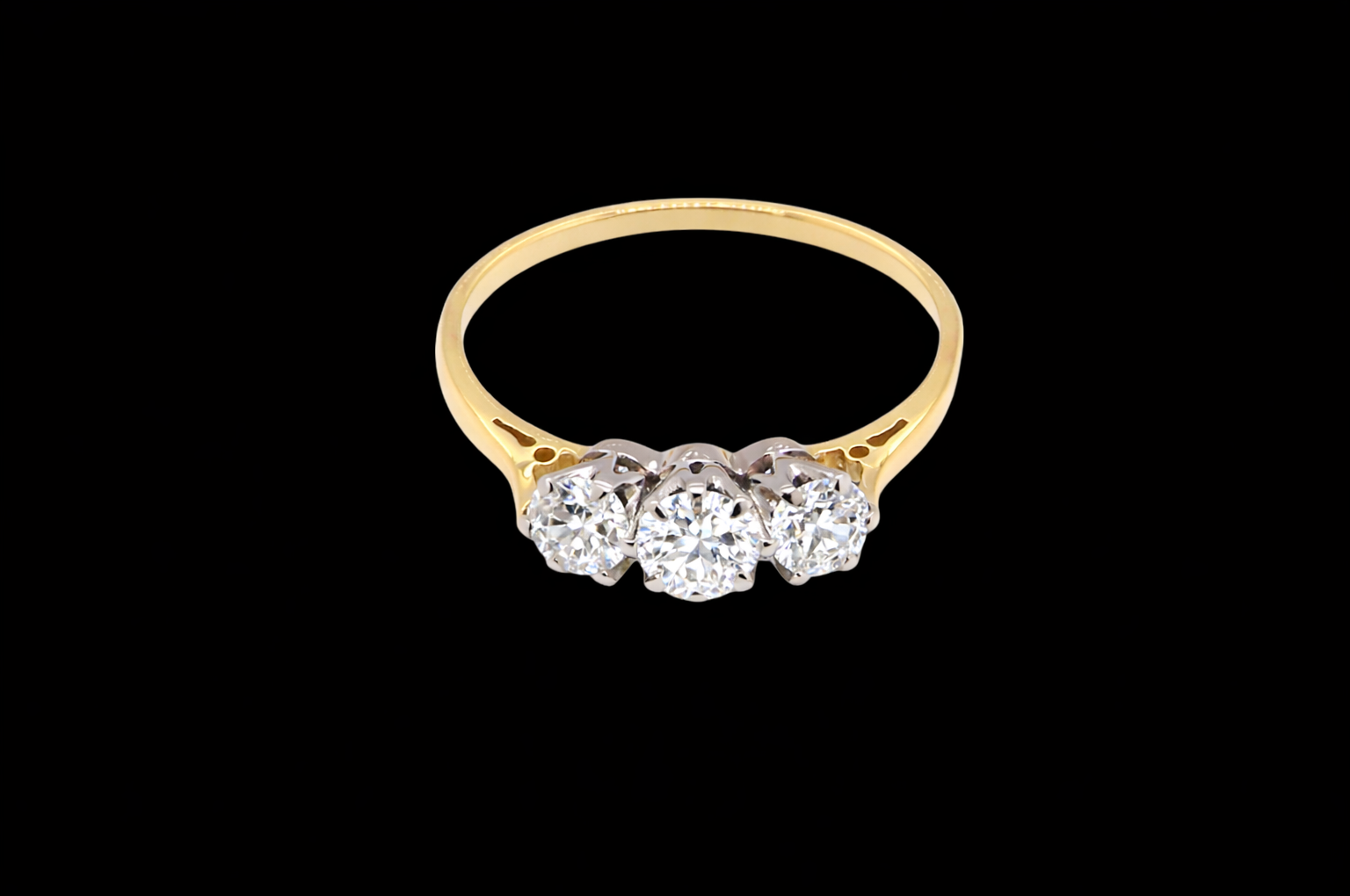 Diamond ring Band tests as 18 carat yellow gold. No hallmarks present as not required for the period, assumed here to be 1930-1940.
