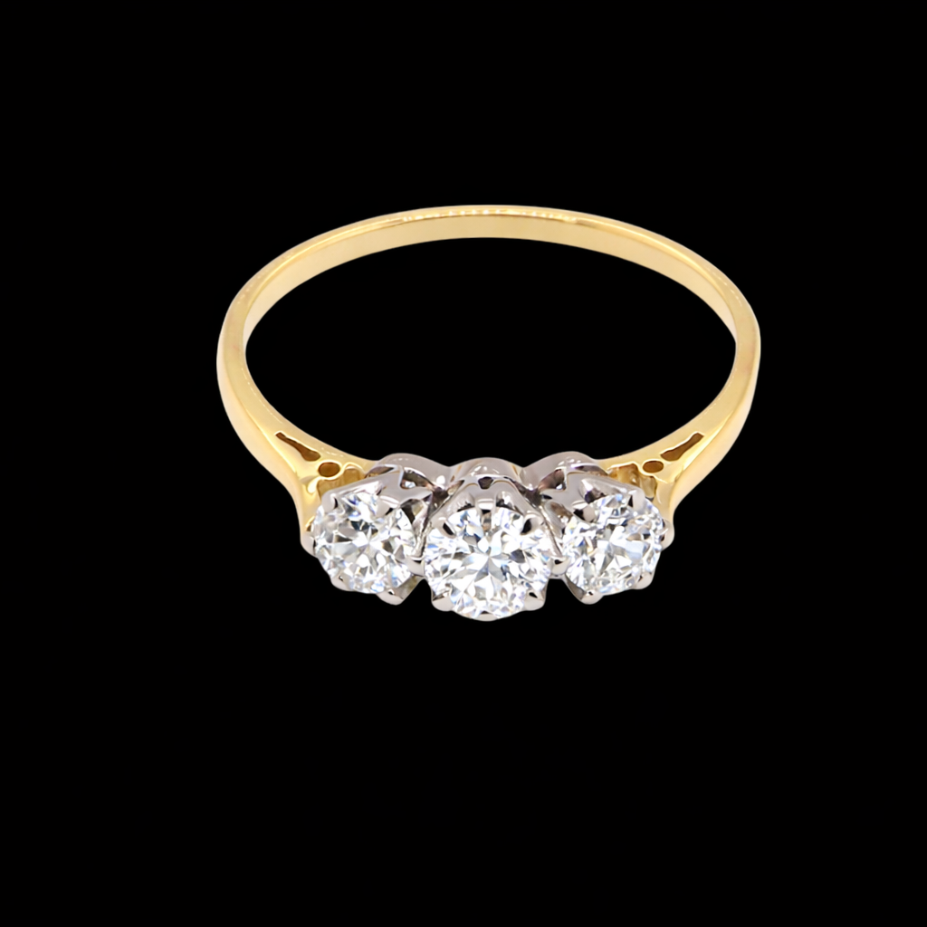 Diamond ring Band tests as 18 carat yellow gold. No hallmarks present as not required for the period, assumed here to be 1930-1940.