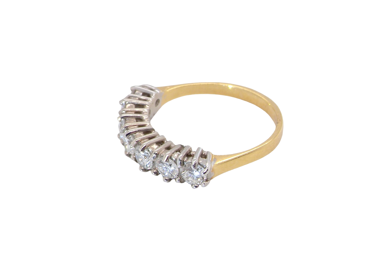 A Seven-Stone Half Hoop Diamond Ring