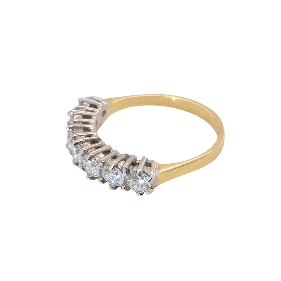 A Seven-Stone Half Hoop Diamond Ring