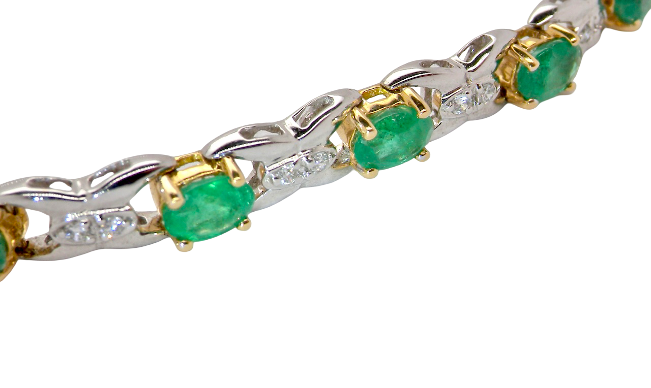 A white gold Emerald and Diamond bracelet