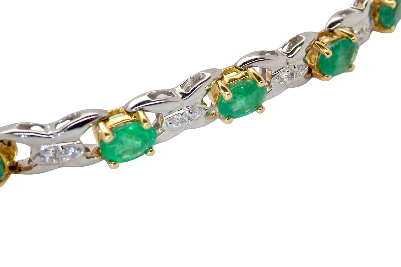 A white gold Emerald and Diamond bracelet
