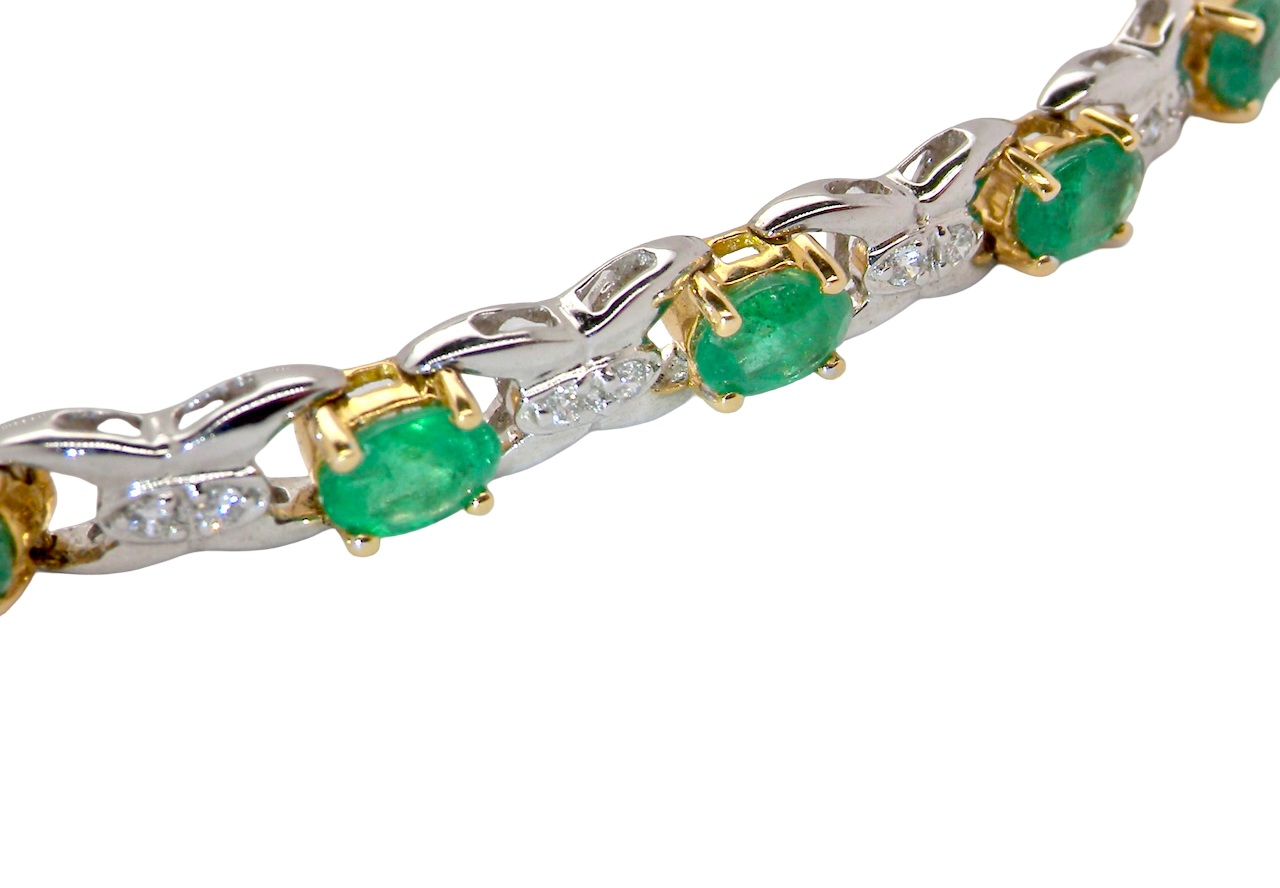 A white gold Emerald and Diamond bracelet
