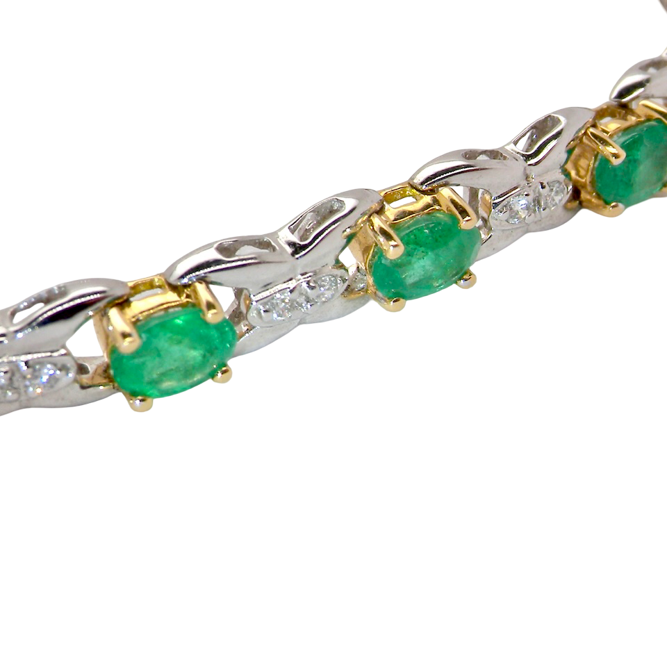 A white gold Emerald and Diamond bracelet
