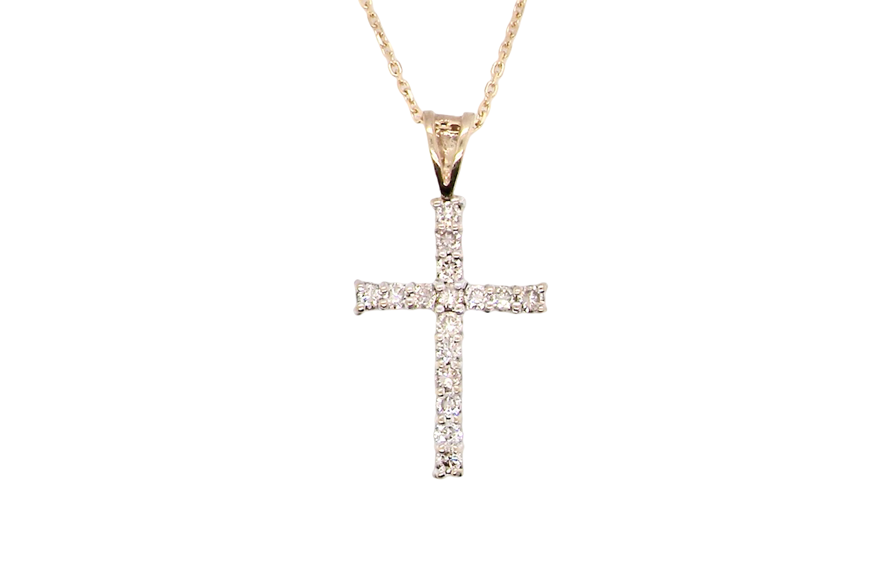 A 9 carat gold cross pendant. Set with fifteen small brilliant cut white diamonds.
Each 1.6mm, total carat weight estimated at 0.30 carats. Colour i-k, clarity Si. Overall size 18x12.5mm. Attached to an 18' neck chain.