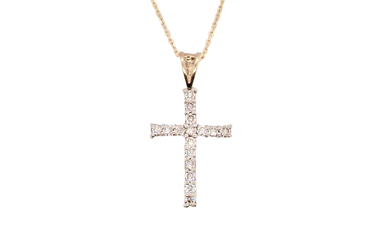 A 9 carat gold cross pendant. Set with fifteen small brilliant cut white diamonds.
Each 1.6mm, total carat weight estimated at 0.30 carats. Colour i-k, clarity Si. Overall size 18x12.5mm. Attached to an 18' neck chain.