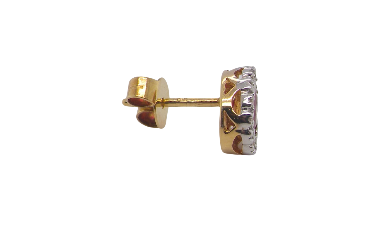 Gold and diamond stud earrings on a white background