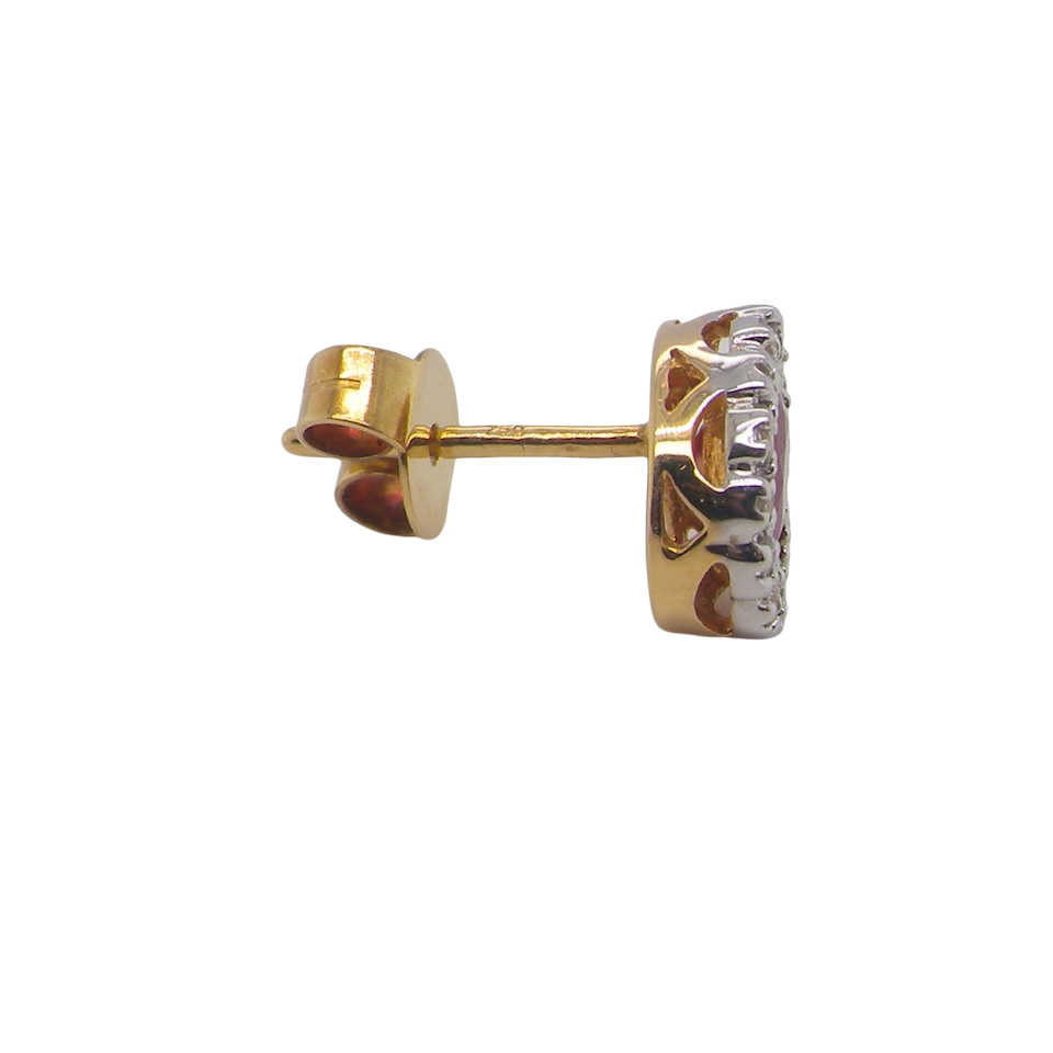 Gold and diamond stud earrings on a white background