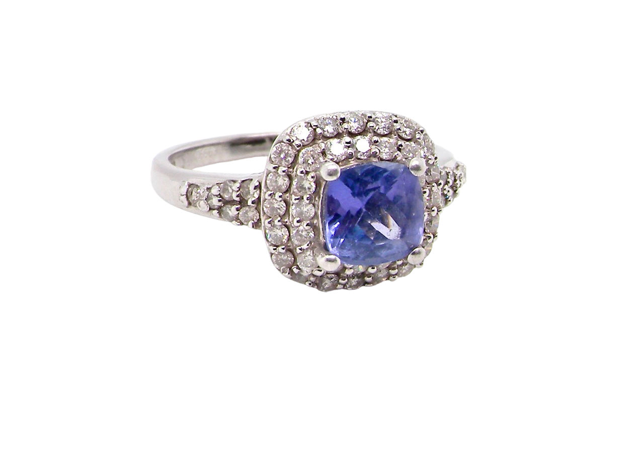 white gold tanzanite and diamond cluster ring
