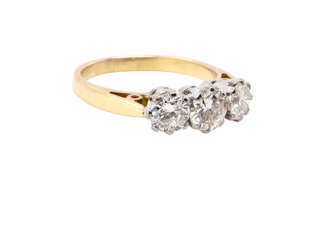 A three stone diamond engagement ring