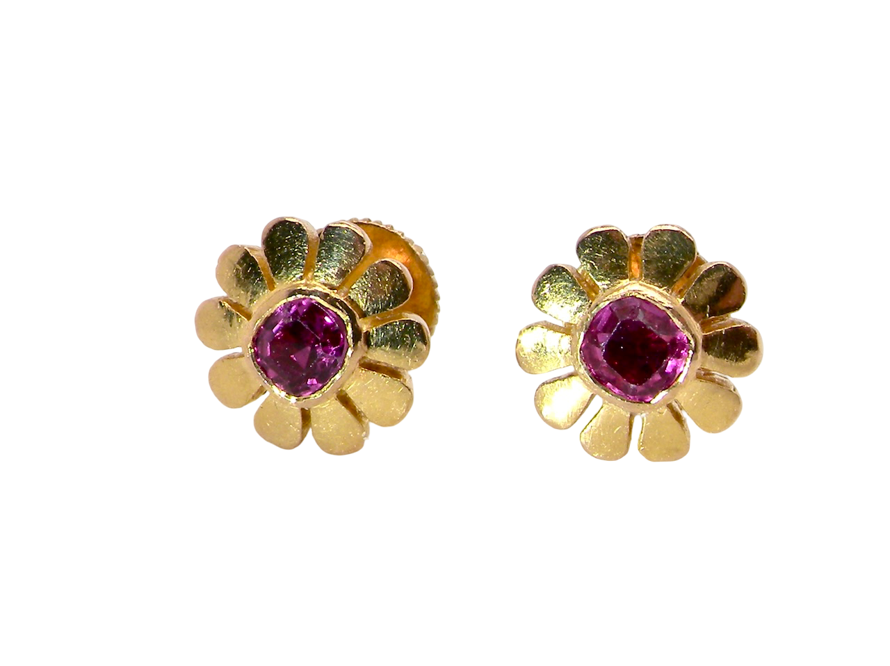 An exceptional pair of ruby earrings.Each earring is centred with a cushion-shaped ruby measuring approximately 3.6–3.8mm,