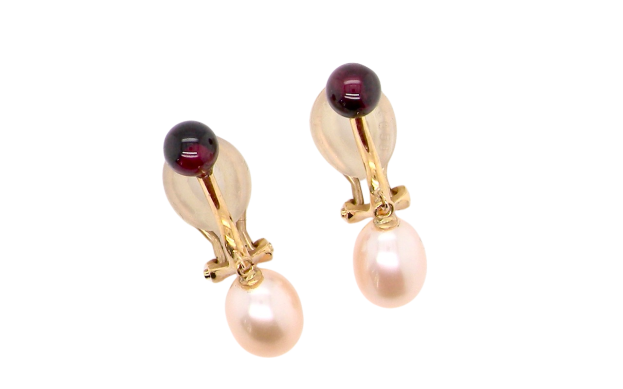 A pair of pearl and garnet earrings