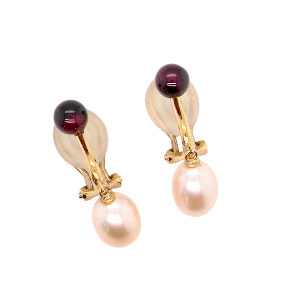 A pair of pearl and garnet earrings