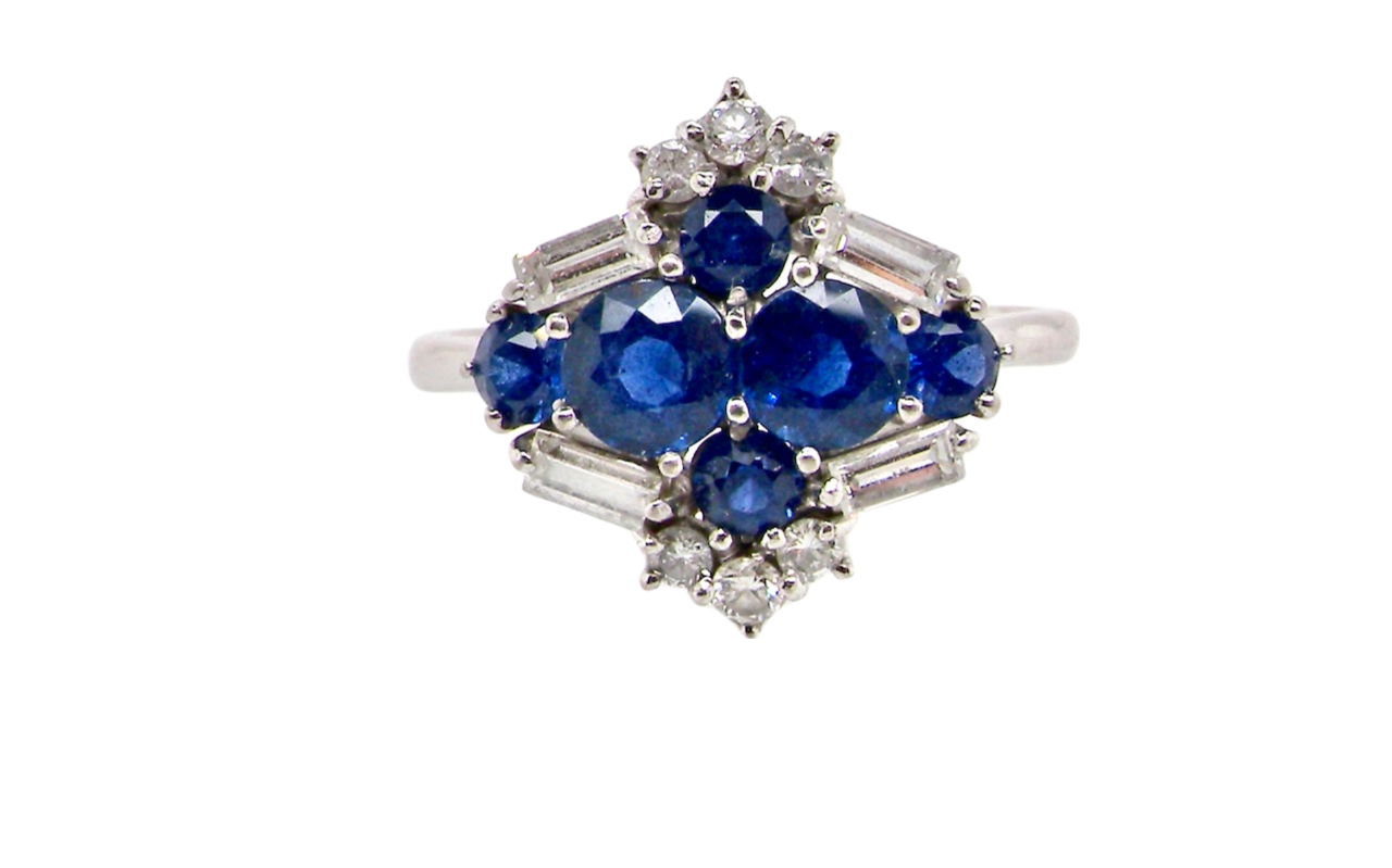 An 18 carat white gold sapphire and diamond ring