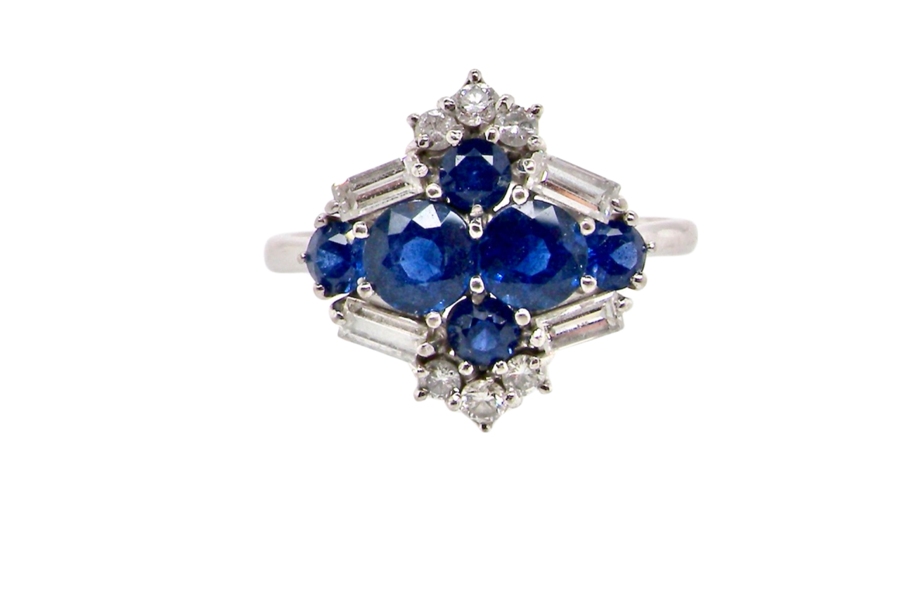 An 18 carat white gold sapphire and diamond ring