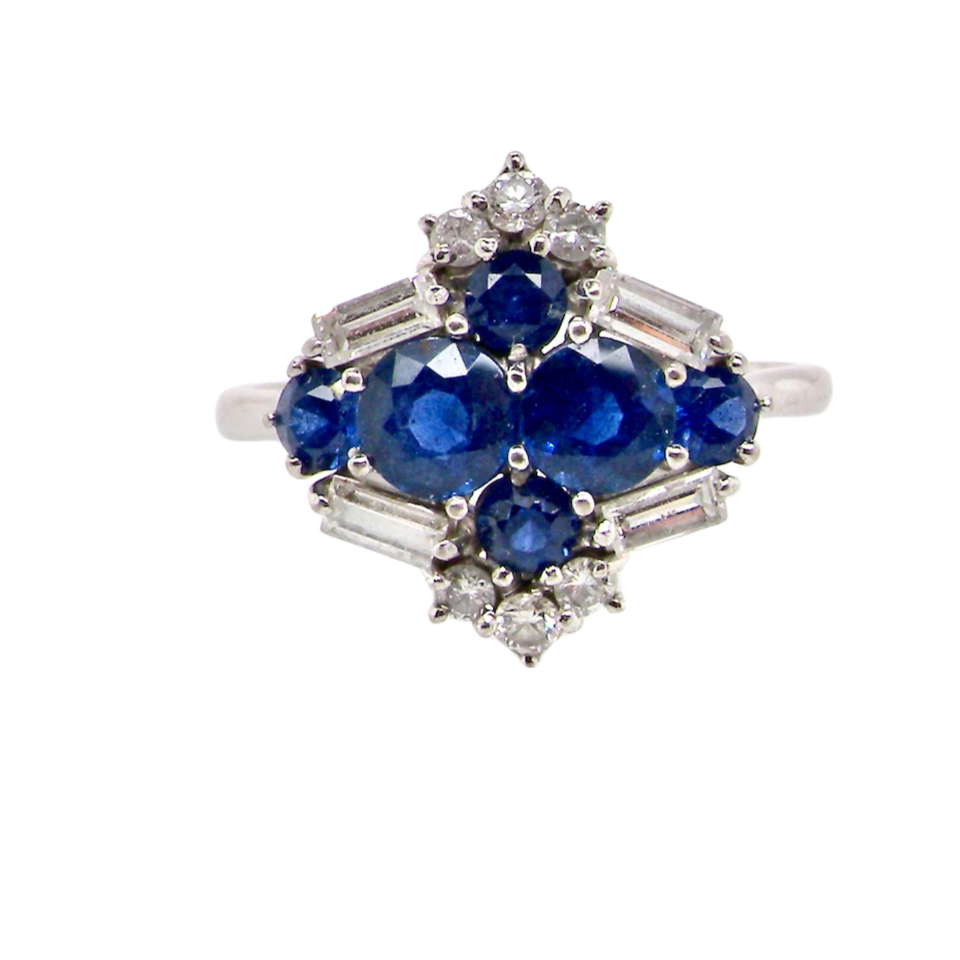 An 18 carat white gold sapphire and diamond ring
