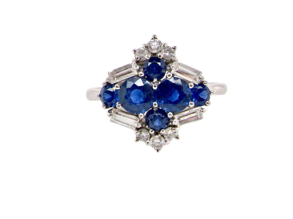 An 18 carat white gold sapphire and diamond  ring