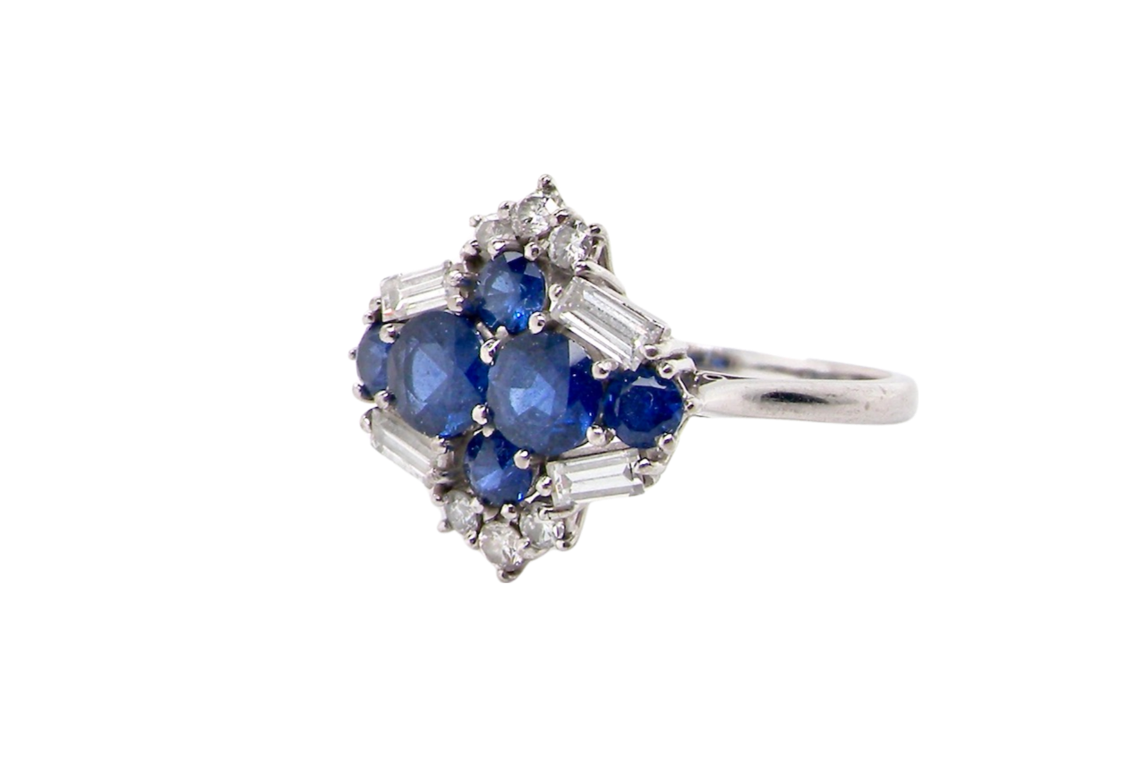 18 carat white gold sapphire and diamond cluster ring