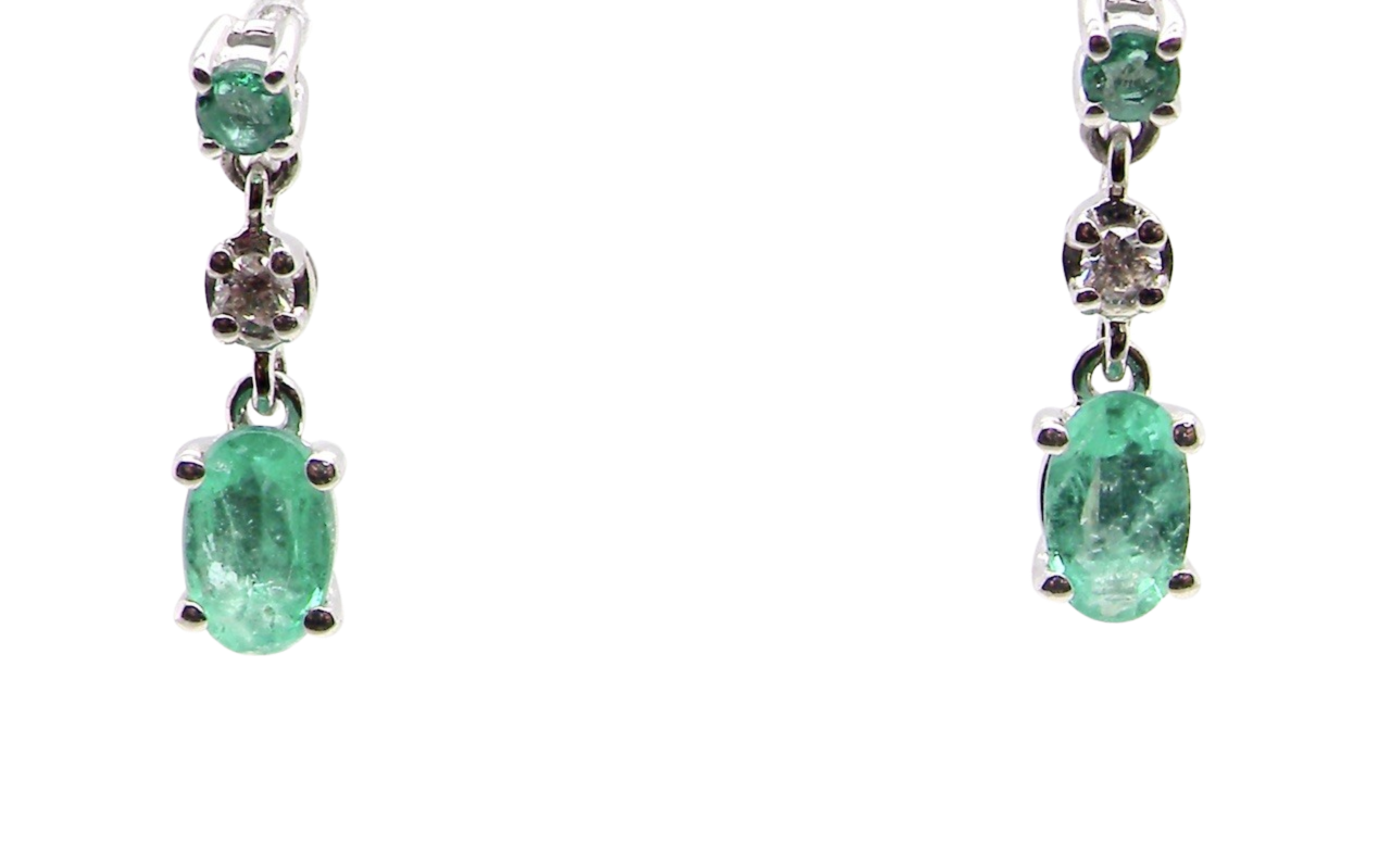 A pair of emerald and diamond earrings