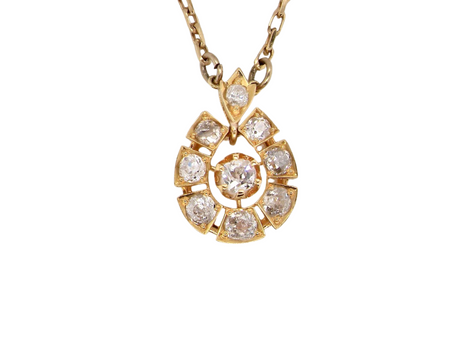 A fine diamond set horseshoe pendant