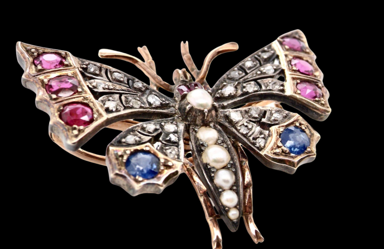 A Victorian gemstone butterfly brooch