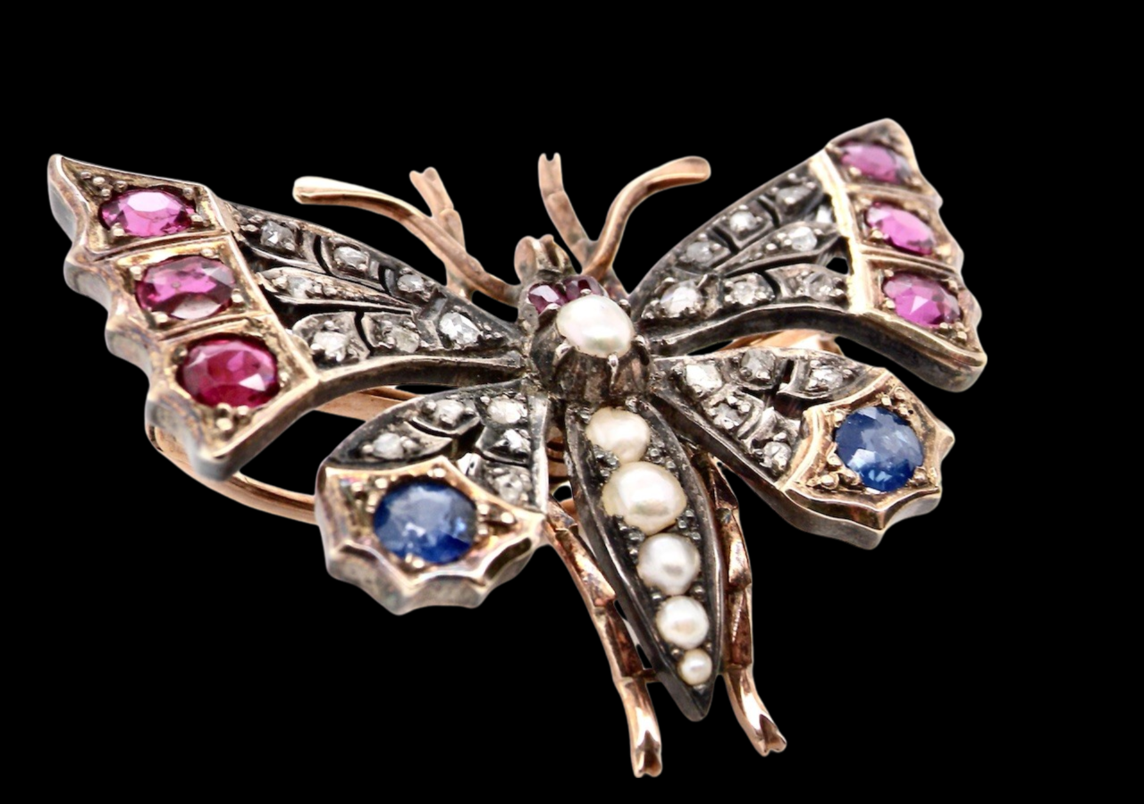 A Victorian gemstone butterfly brooch