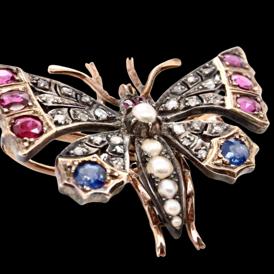 A Victorian gemstone butterfly brooch