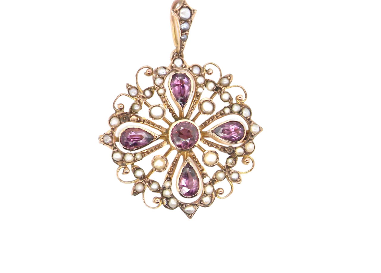 A fine amethyst and pearl pendant/brooch