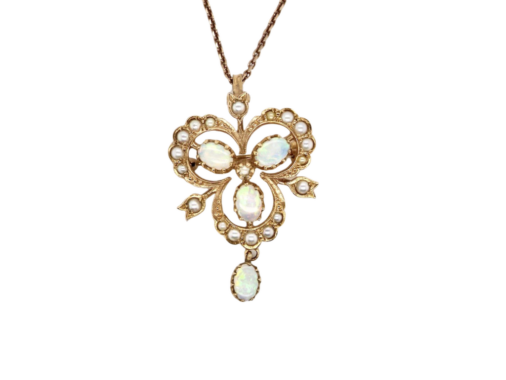 A fine opal and pearl pendant